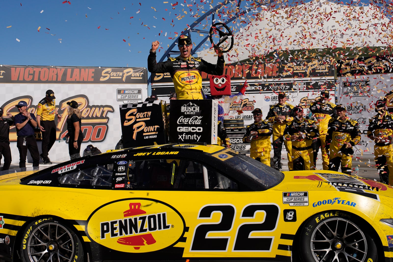 NASCAR Cup Series driver Joey Logano (22) celebrates after winning a NASCAR Cup Series auto race Sunday, Oct. 20, 2024, in Las Vegas. (AP Photo/John Locher)