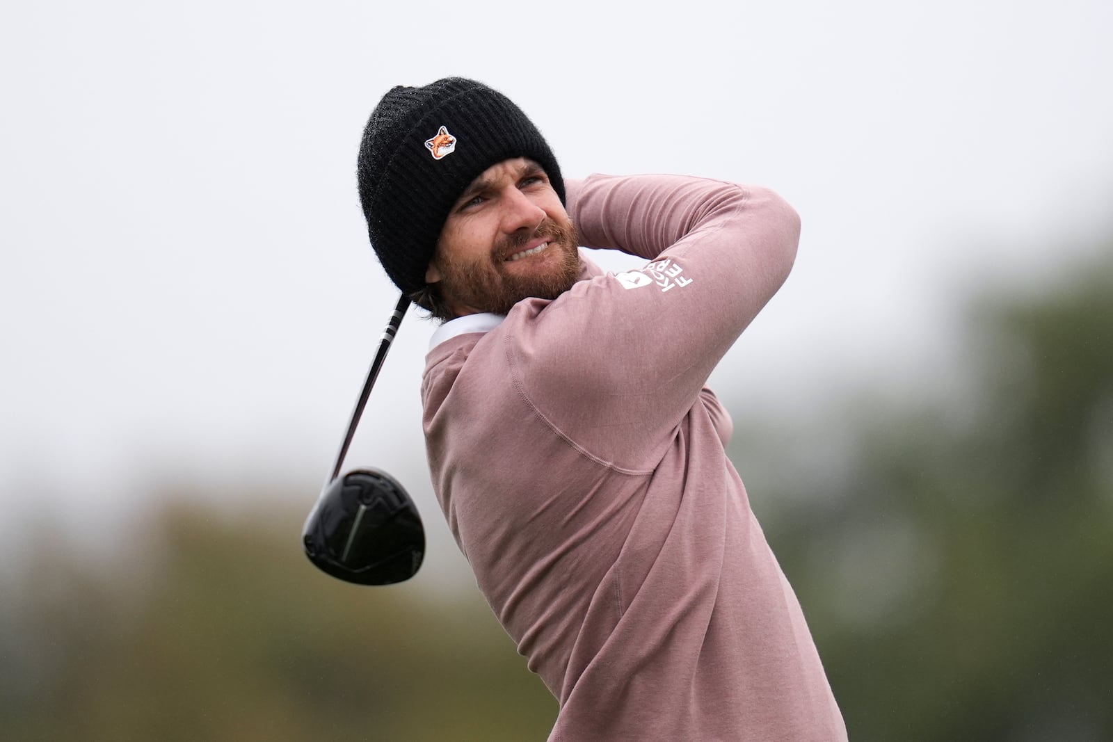 Patrick Rodgers hits his tee shot on the second hole of the South Course at Torrey Pines during the first round of the Genesis Invitational golf tournament Thursday, Feb. 13, 2025, in San Diego. (AP Photo/Gregory Bull)