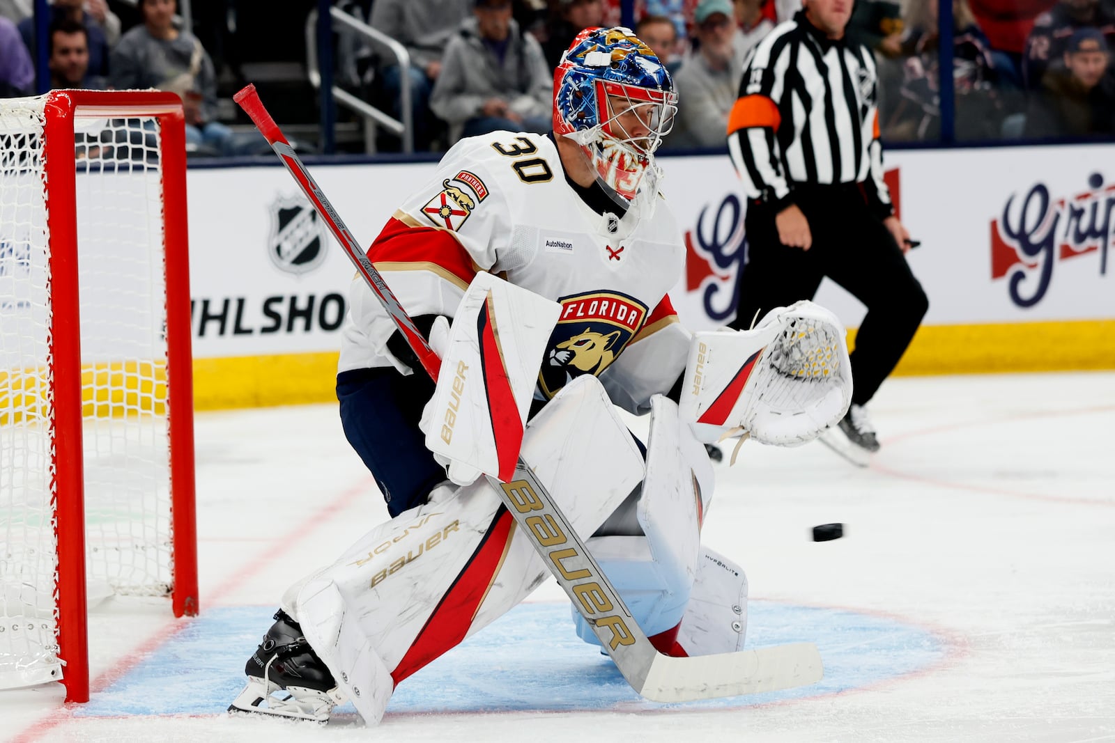 Florida Panthers' Spencer Knight makes a save against the Columbus Blue Jackets during the second period of an NHL hockey game Tuesday, Oct. 15, 2024, in Columbus, Ohio. (AP Photo/Jay LaPrete)