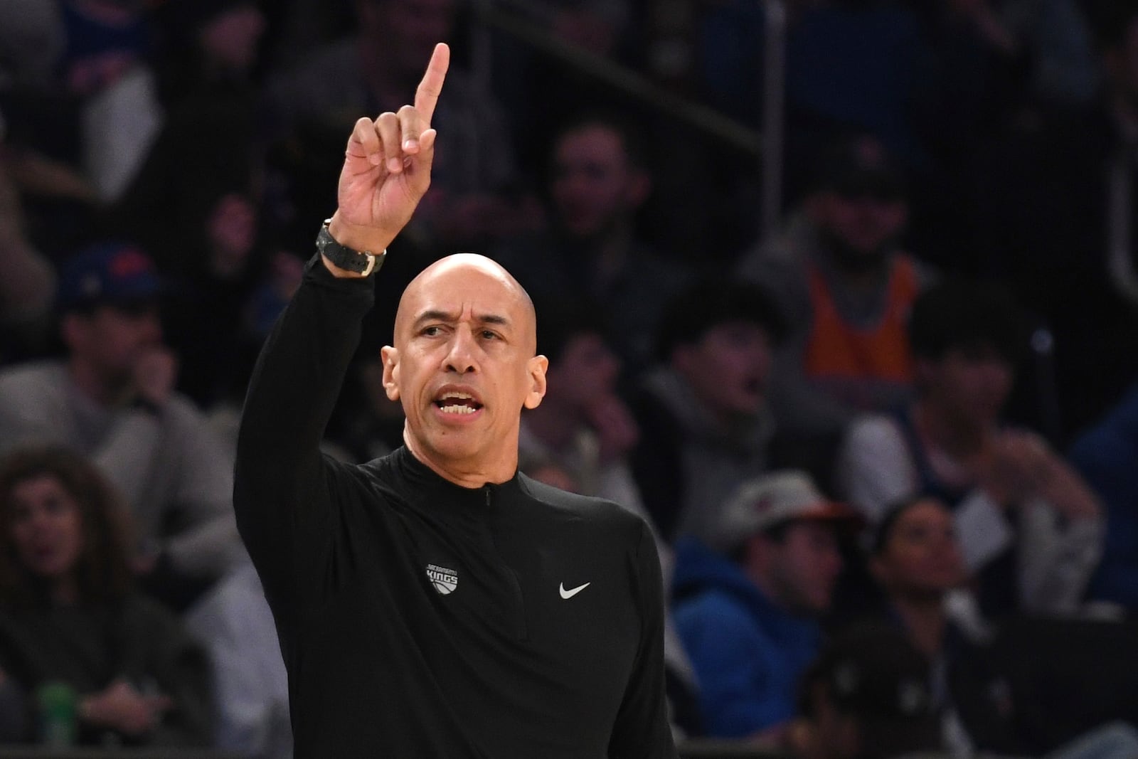 Sacramento Kings head coach Doug Christie gestures on the court during the first half of an NBA basketball game against the New York Knicks, Saturday, Jan. 25, 2025, in New York. (AP Photo/Pamela Smith)