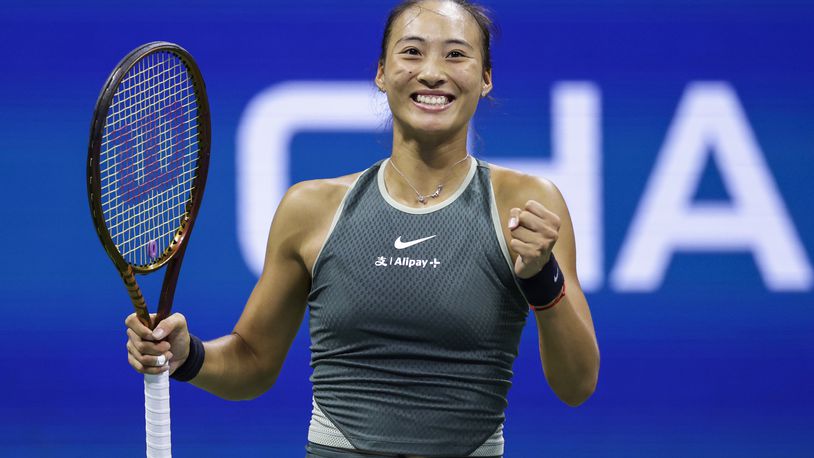 Zheng Qinwen, of China, reacts after defeating Donna Veki, of Croatia, during the fourth round of the U.S. Open tennis tournament Monday, Sept. 2, 2024, in New York. (AP Photo/Adam Hunger)