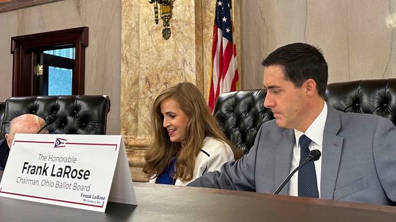 Ohio Secretary of State Frank LaRose, right, and state Sen. Theresa Gavarone prepare for a meeting of the Ohio Ballot Board at the Ohio Statehouse in Columbus, Ohio, Friday, Aug. 16, 2024. (AP Photo/Julie Carr Smyth)