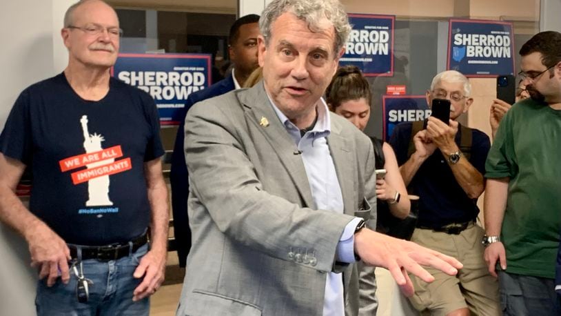 U.S. Sen. Sherrod Brown, D-Ohio, speaks to volunteers during a canvassing event Sunday afternoon in Dayton. LONDON BISHOP/STAFF