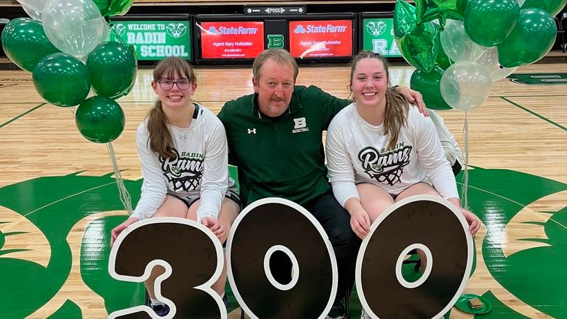 Pictured are Badin seniors Paige Butler and Shelby Mulcare with Rams coach Tom Sunderman, who got his 300th career coaching victory on Wednesday night. CONTRIBUTED