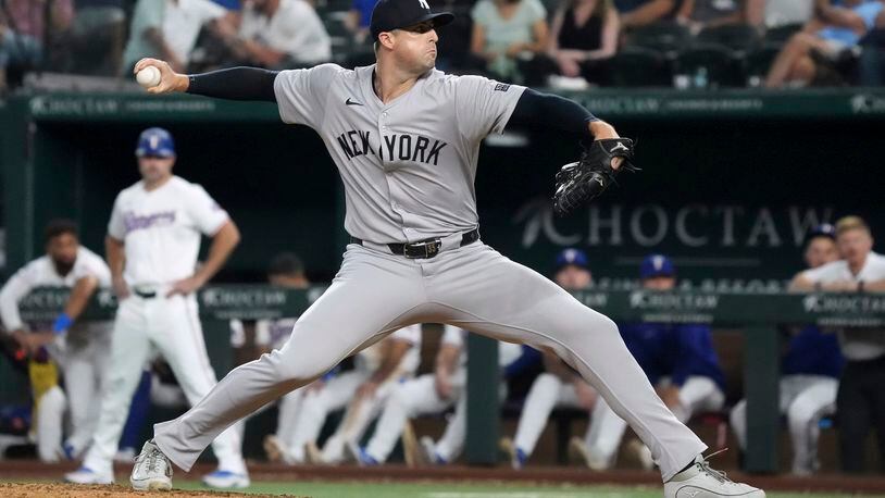 New York Yankees relief pitcher Clay Holmes pitches against the Texas Rangers during the ninth inning of a baseball game Tuesday, Sept. 3, 2024, in Arlington, Texas. (AP Photo/Jeffrey McWhorter)