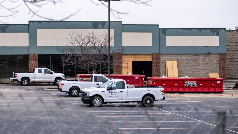 Contractors are already at work transforming the former IGA grocery into the new Monroe Police Headquarters on South Main Street. NICK GRAHAM/STAFF