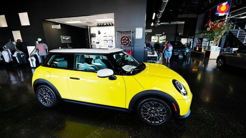 FILE - A 2025 Cooper S hardtop sits on display in the showroom of a Mini dealership Sept. 4, 2024, in Highlands Ranch, Colo. (AP Photo/David Zalubowski, File)