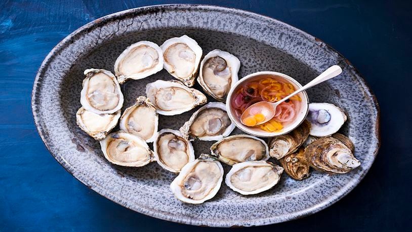 UNDATED â BC-EVERYDAY-FOOD-OYSTERS-ART-NYTSF â Plump, juicy raw oysters are topped with a drizzle of tangy vinegar sauce. (CREDIT: MIKKEL VANG)--ONLY FOR USE WITH ARTICLE SLUGGED â BC-EVERYDAY-FOOD-OYSTERS-ART-NYTSF â  OTHER USE PROHIBITED.