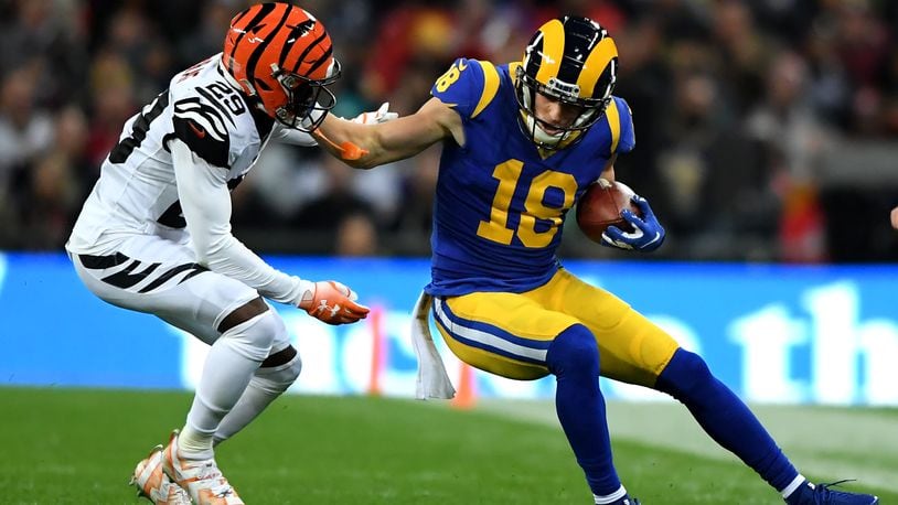 LONDON, ENGLAND - OCTOBER 27: Jared Goff of Los Angeles Rams hands off Tony McRae of Cincinnati Bengals during the NFL game between Cincinnati Bengals and Los Angeles Rams at Wembley Stadium on October 27, 2019 in London, England. (Photo by Alex Davidson/Getty Images)