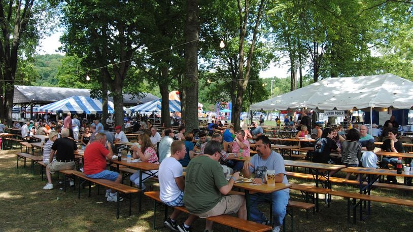 People enjoy the food, beer and music at a past Oktoberfest at Liberty Home Association, located at 2361 Hamilton Cleves Road in Hamilton. FILE PHOTO