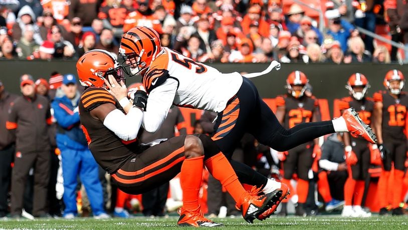 CLEVELAND, OH - DECEMBER 8: Nick Vigil #59 of the Cincinnati Bengals forces a fumble by David Njoku #85 of the Cleveland Browns during the first quarter at FirstEnergy Stadium on December 8, 2019 in Cleveland, Ohio. (Photo by Kirk Irwin/Getty Images)